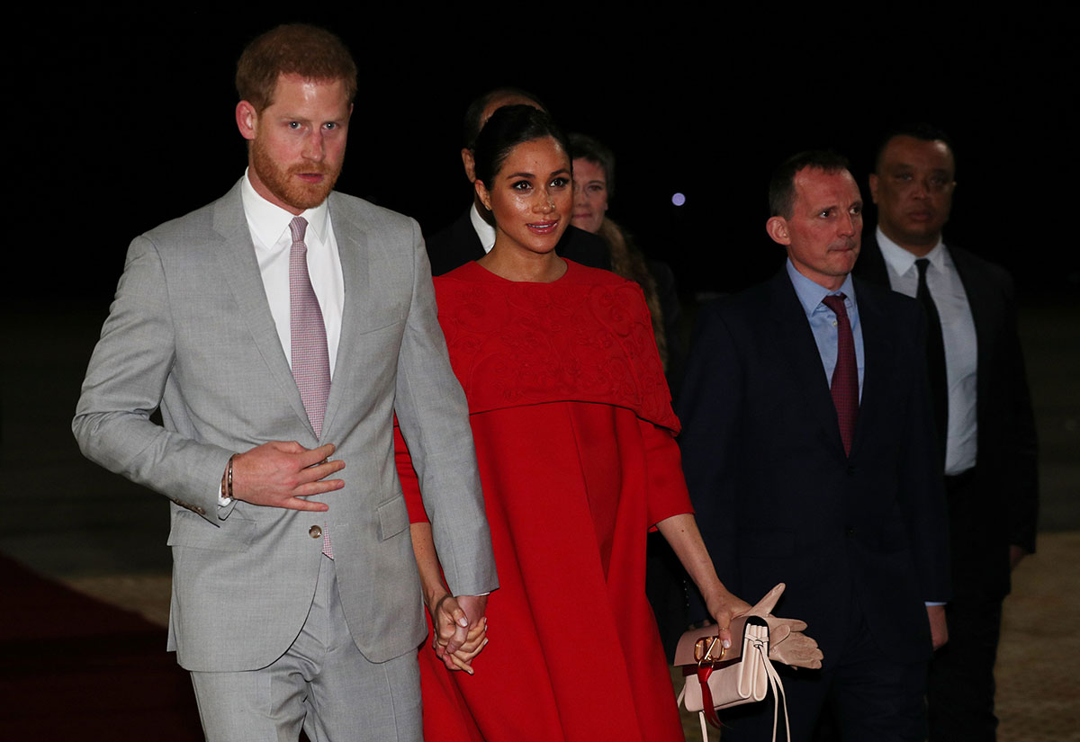 Prince Harry, Duke of Sussex and Meghan, Duchess of Sussex are welcomed by British Ambassador to Morocco Thomas Reilly as they arrive at Casablanca Airport on February 23, 2019 in Morocco.