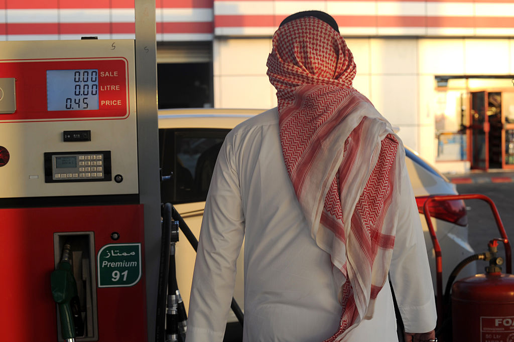 A Saudi man walks past a pump at a petrol station in the Red Sea city of Jeddah Saudi Arabia s
Photo: AMER HILABI/AFP/Getty Images