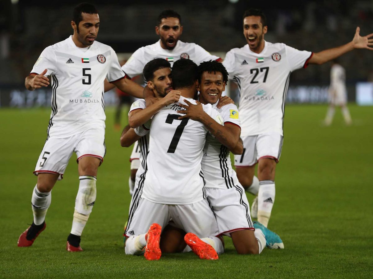 Ali Mabkhout of Al-Jazira celebrates scoring the first goal with team mates during the FIFA Club World Cup match between Al Jazira and Urawa Red Diamonds at Zayed Sports City Stadium in Abu Dhabi.