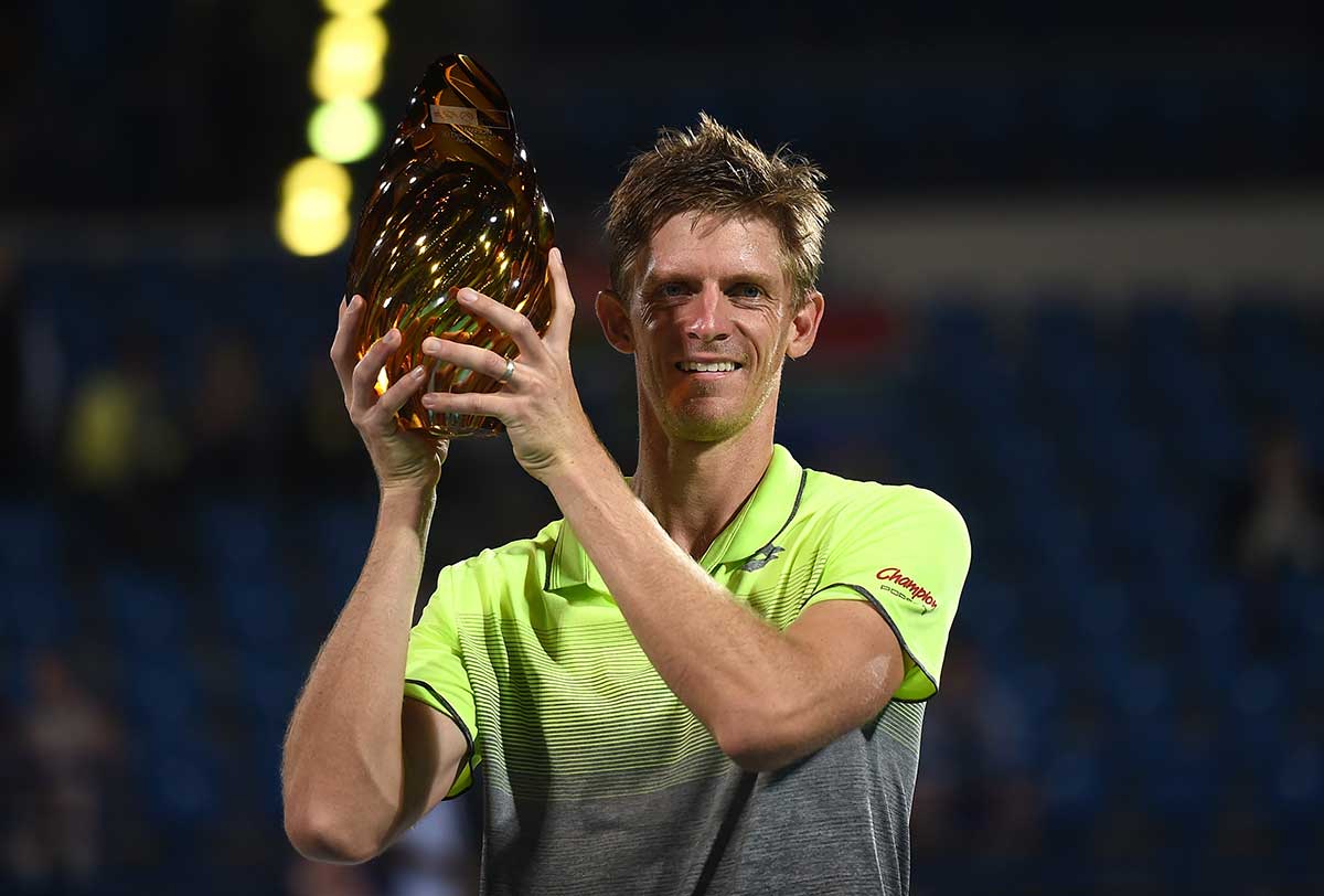 Kevin Anderson of South Africa poses with the trophy after winning his final match against Roberto Bautista Agut of Spain on day three of the Mubadala World Tennis Championship at International Tennis Centre, Zayed Sports City in Abu Dhabi.