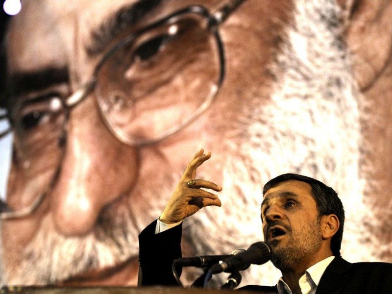 Iranian President Mahmoud Ahmadinejad delivers a speech under a portrait of Irans supreme leader, Ayatollah Ali Khamenei. (AFP/Getty Images)