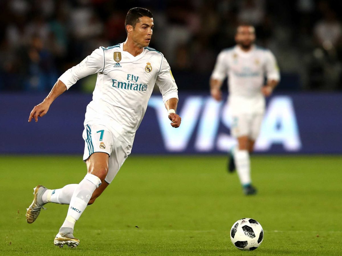 Cristiano Ronaldo of Real Madrid runs with the ball during the FIFA Club World Cup UAE 2017 Final between Gremio and Real Madrid at the Zayed Sports City Stadium in Abu Dhabi.