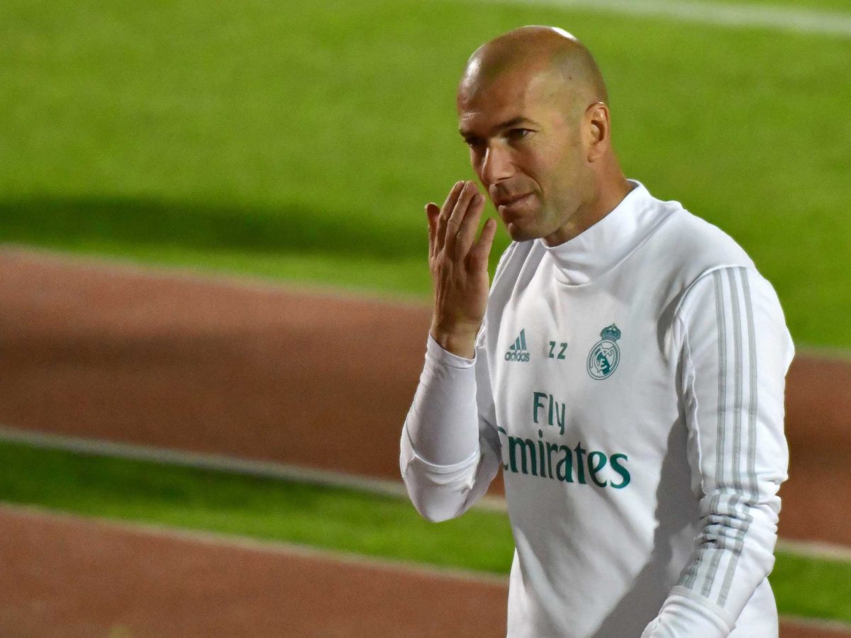 Real Madrid's French coach Zinedine Zidane walks on the pitch during a training session two days prior to their FIFA Club World Cup semi-final match at New York University Abu Dhabi's stadium in Abu Dhabi.