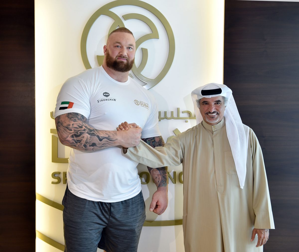 Saeed Hareb, secretary-general of DSC, with Hafthor Bjornsson, winner of the World’s Ultimate Strongman title in Dubai.