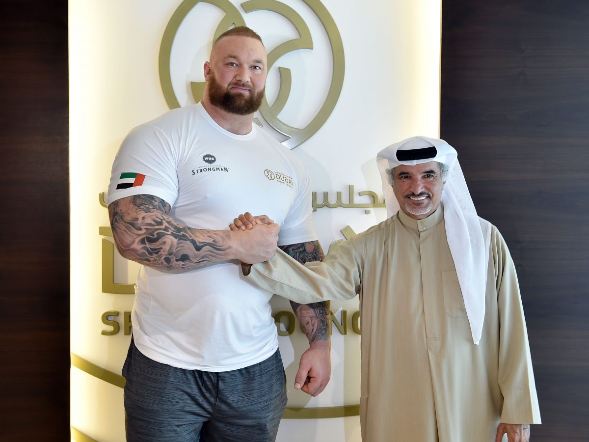 Saeed Hareb, secretary-general of DSC, with Hafthor Bjornsson, winner of the World’s Ultimate Strongman title in Dubai.