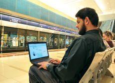 A Dubai Metro commuter accessing WiFi backhauled through WiMAX.