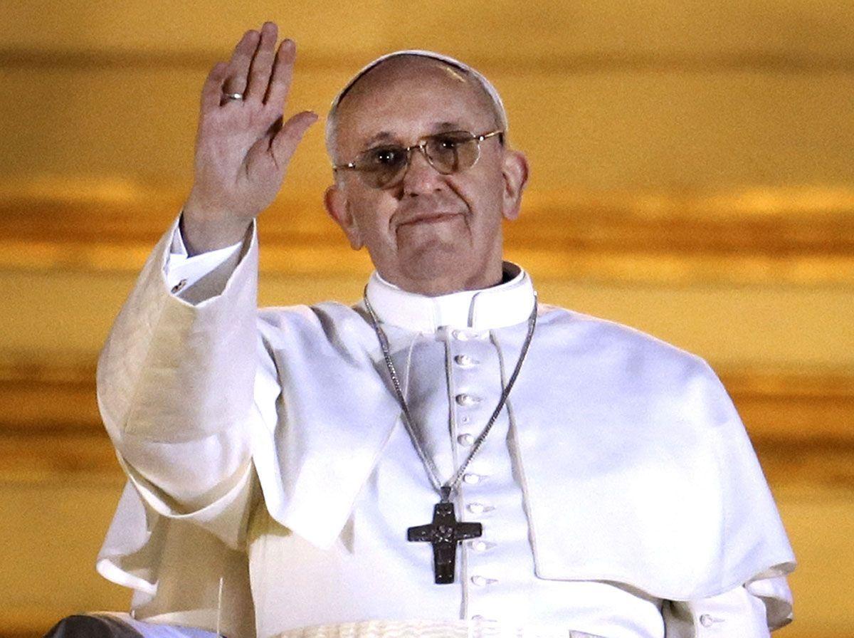 Pope Francis I waves to the waiting crowd from the central balcony of St Peter's Basilica in Vatican City. (Peter Macdiarmid/Getty Images)