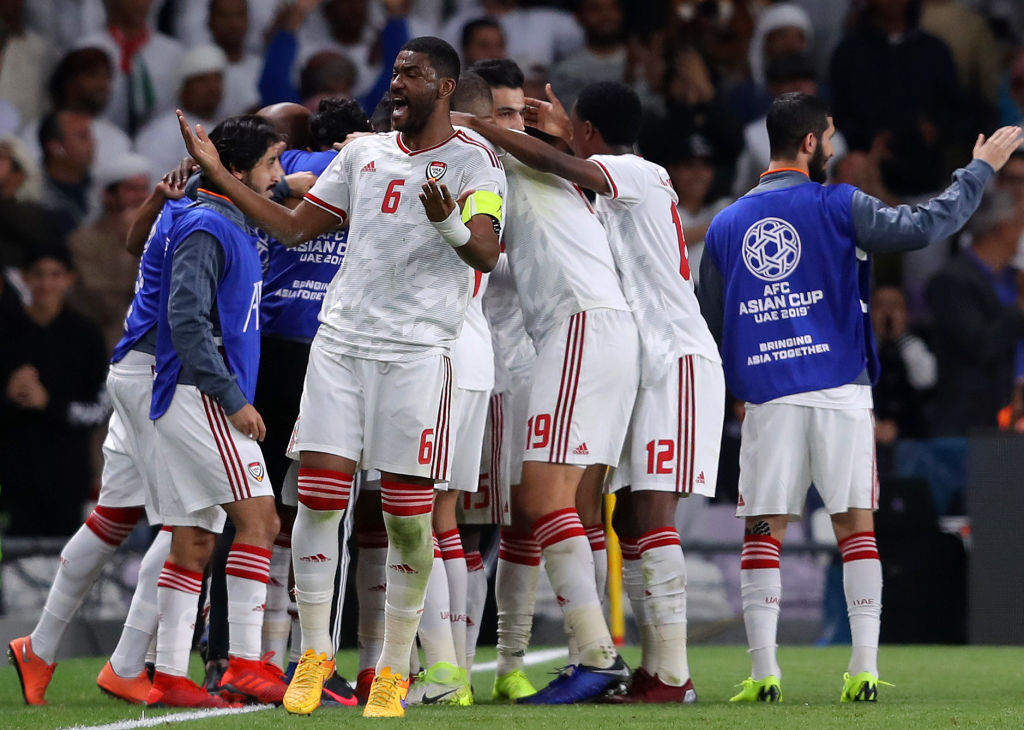 Fares Juma Al Saadi of the UAE celebrates after his teammate Ali Ahmed Mabkhout scores his side's first goal during the AFC Asian Cup quarter final match between UAE and Australia at Hazza Bin Zayed Stadium.  Photo by Francois Nel/Getty Images.