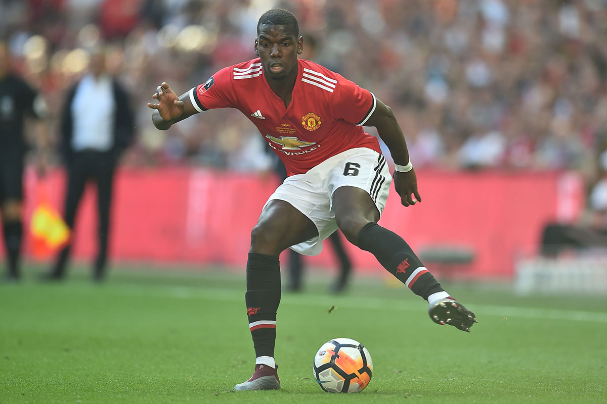 Paul Pogba in action for Manchester United. The club are currently in fourth place in the Premier League standings, 14 points behind leaders and rivals Manchester City.