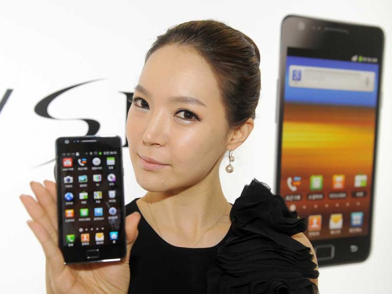 A South Korean model poses with Samsung Electronics new smartphone Galaxy S2 during its launching event in Seoul on April 28, 2011. The Galaxy S2 smartphone will be released in about 120 countries through some 140 mobile operators worldwide starting in May, Samsung said. The Android-based phone powered by a 1.2-gigahertz dual core processo