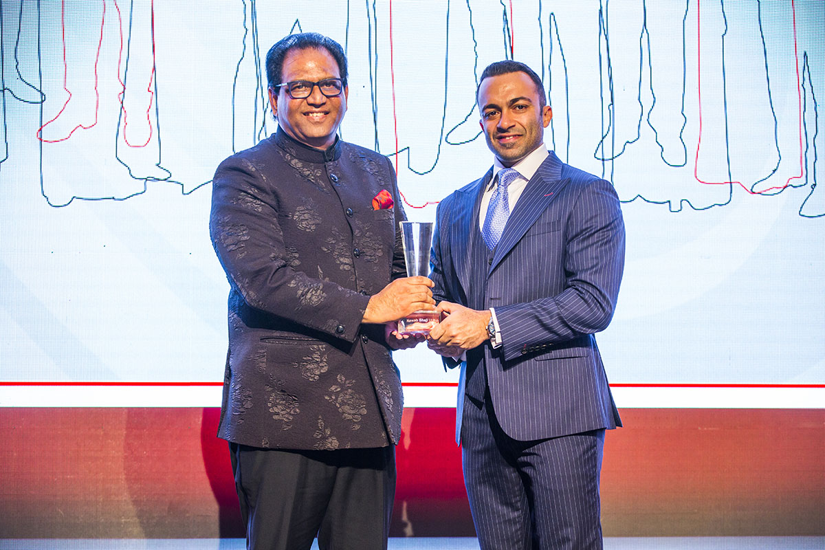 Shaji Ul Mulk receiving his award from Ali Akawi, CEO of ITP Media Group.