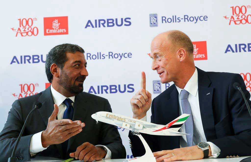 Emirates chairman and CEO Sheikh Ahmed pictured talking with Airbus CEO Tom Enders  give a joint press conference during a ceremony to mark the 100th Airbus A380 received by Emirates at the German headquarters of the aircraft company in Hamburg. 
Photo: CHRISTIAN CHARISIUS/AFP/Getty Images.