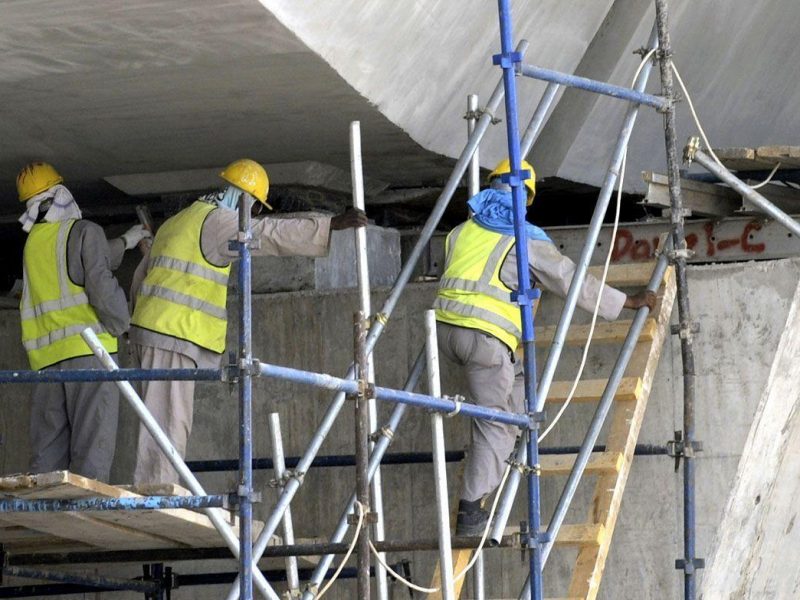 Asian laborers work at a flyover construction site in eastern Riyadh. Saudi Arabia gave illegal foreign workers a three-month grace period to legalize their status. (AFP/Getty Images - for illustrative purposes only)