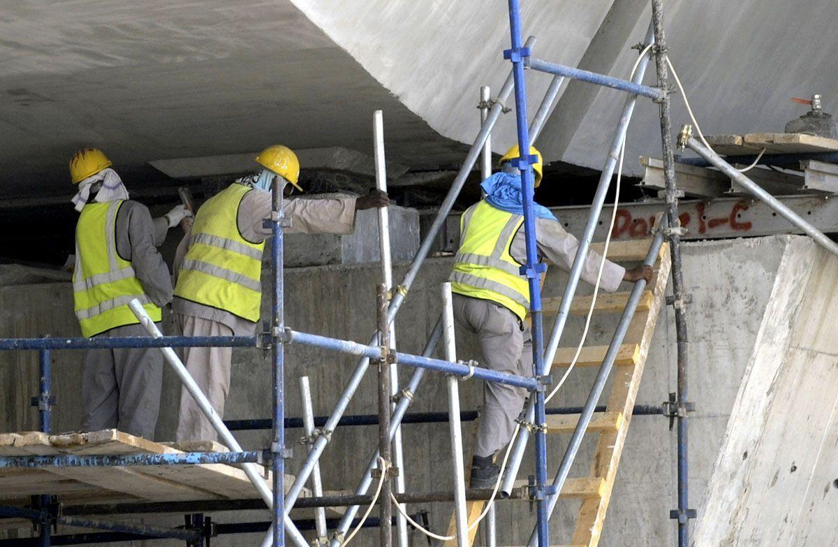 Asian laborers work at a flyover construction site in eastern Riyadh. Saudi Arabia gave illegal foreign workers a three-month grace period to legalize their status. (AFP/Getty Images - for illustrative purposes only)