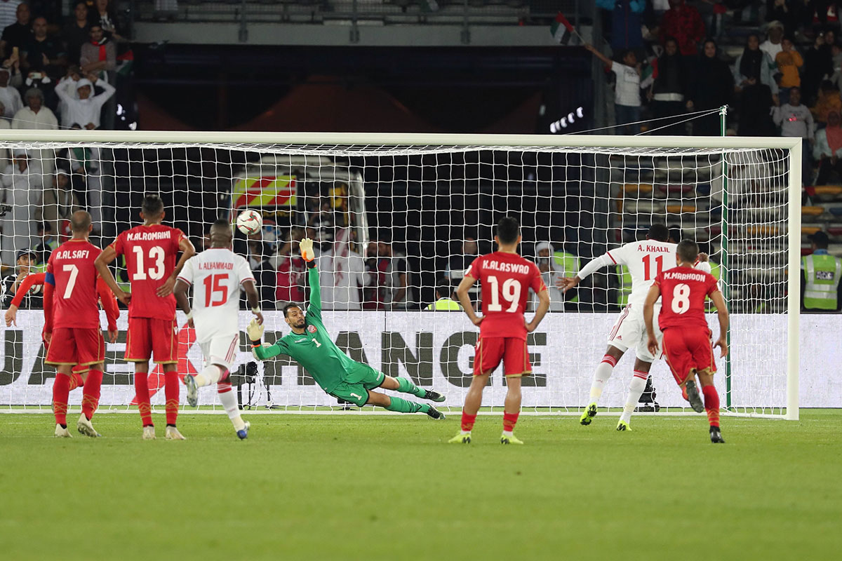 United Arab Emirates' forward Ahmed Khalil (2nd-R) scores a penalty during the 2019 AFC Asian Cup football game between United Arab Emirates and Bahrain at the Zayed sports city stadiuam in Abu Dhabi on January 05, 2019.