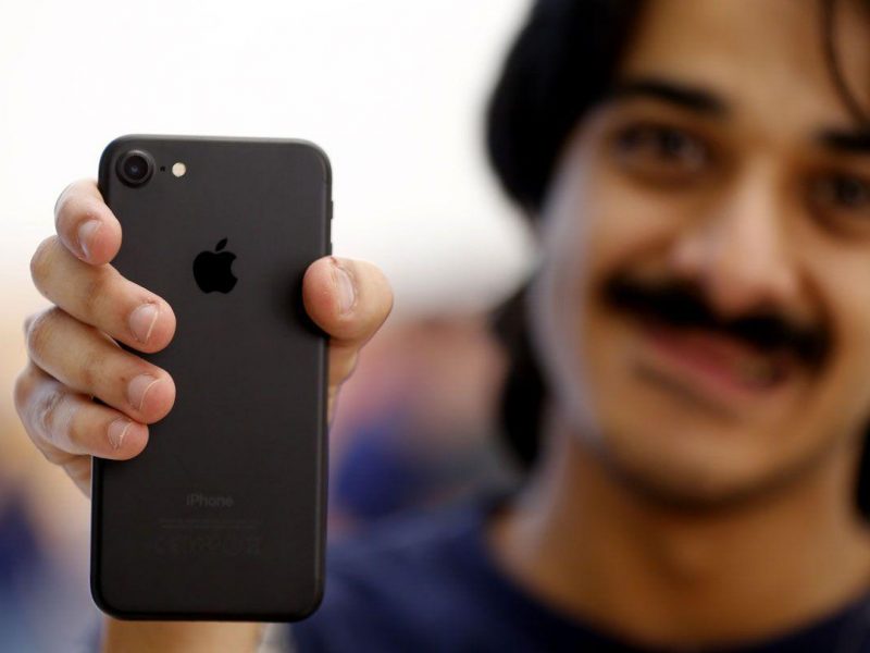 Saudi Ahmed Al Hajri, who queued from 10pm from the previous night, was the first in the UAE to receive the new device. (Karim Sahib/AFP/Getty Images)