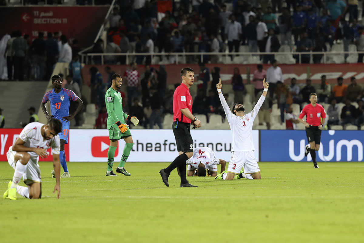 Bahrain's defender Waleed Al Hayam (R) celebrates after winning the 2019 AFC Asian Cup group A football match between India and Bahrain at the Sharjah Stadium in Sharjah on January 14, 2019.