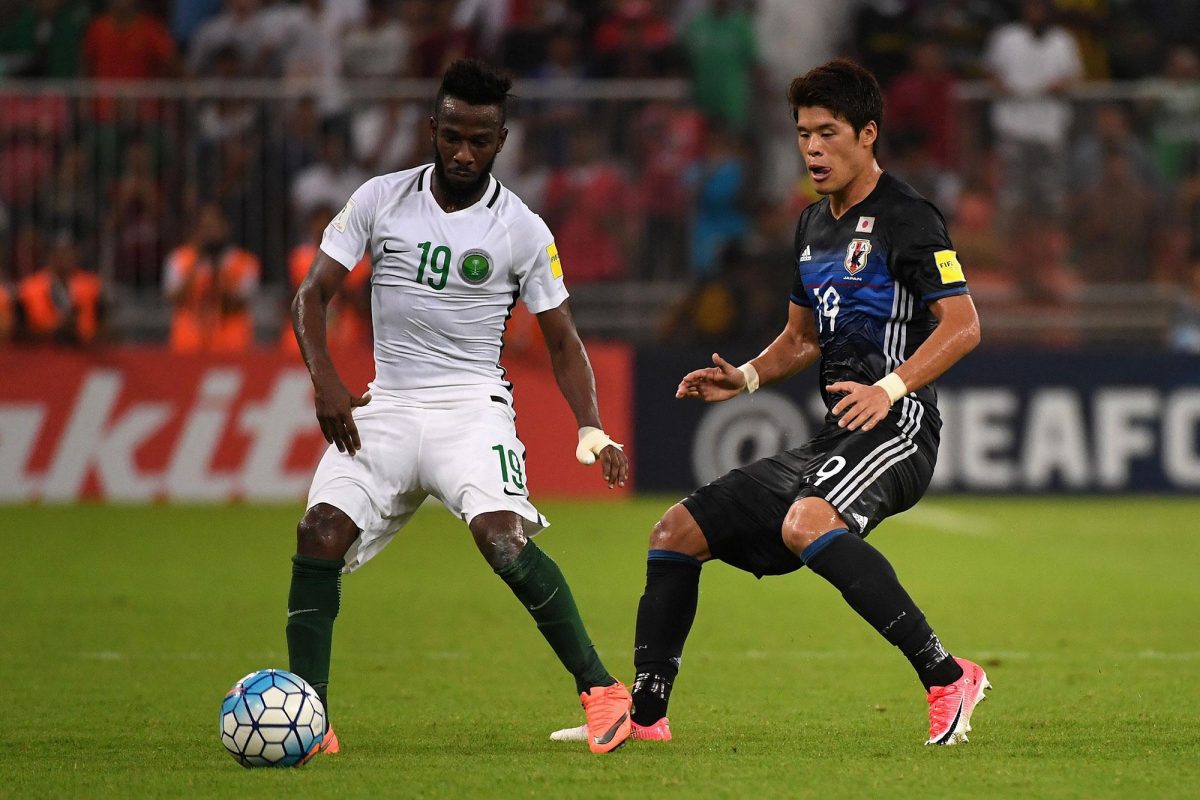 Fahad Al Muwallad of Saudi Arabia controls the ball under pressure of Hiroki Sakai of Japan during the FIFA World Cup qualifier match between Saudi Arabia and Japan at the King Abdullah Sports City on September 5, 2017 in Jeddah, Saudi Arabia. (Getty Images)