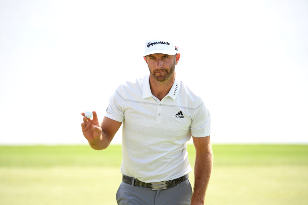 Dustin Johnson celebrates on the eighth hole during day two of the Saudi International at the Royal Greens Golf  Country Club. (Ross Kinnaird/Getty Images)