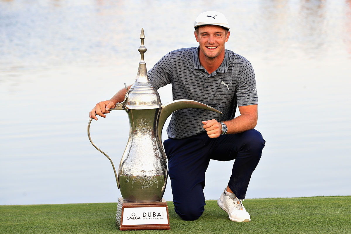 Winner Bryson Dechambeau of United States poses for a photo with his trophy during Day Four of the Omega Dubai Desert Classic at Emirates Golf Club on January 27, 2019 in Dubai.