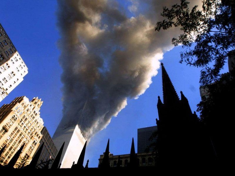 Smoke spews from a tower of the World Trade Center September 11, 2001 after two hijacked airplanes hit the twin towers in an alleged terrorist attack on New York City. (Getty Images)