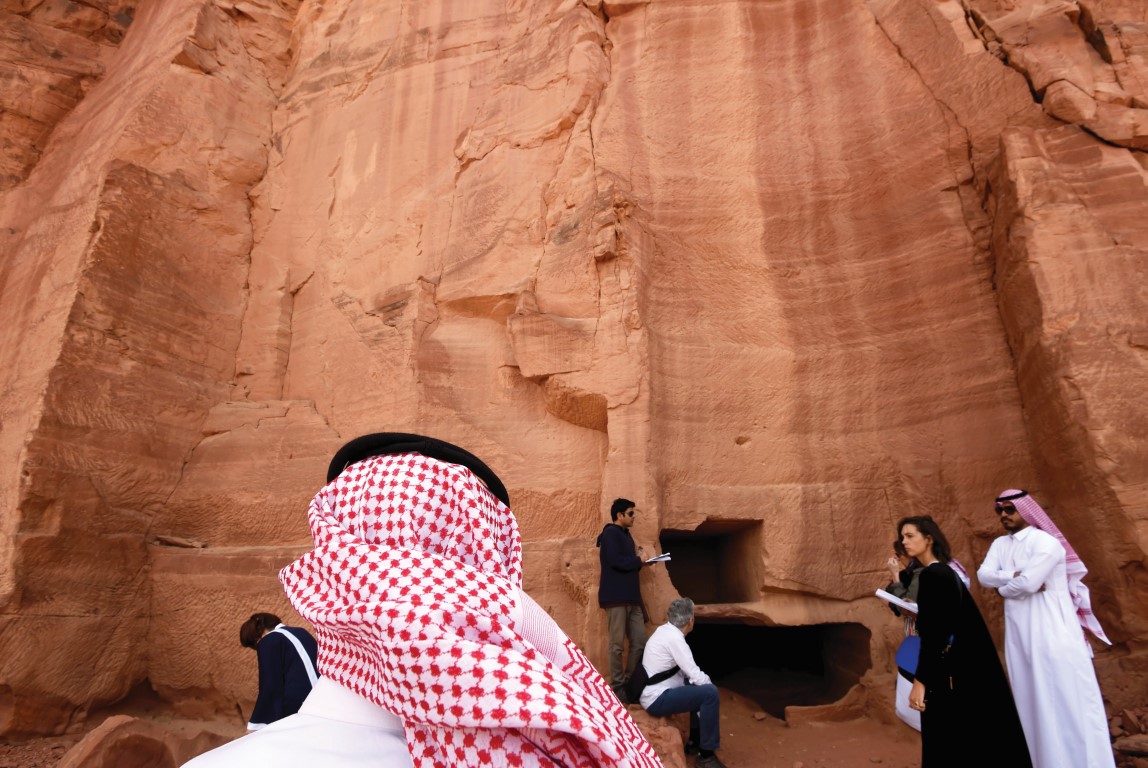 A Saudi man stands at the entrance of a tomb at Madain Saleh, a UNESCO World Heritage site near Saudi Arabia's northwestern town of Al Ula. (Photo credit Getty Images)