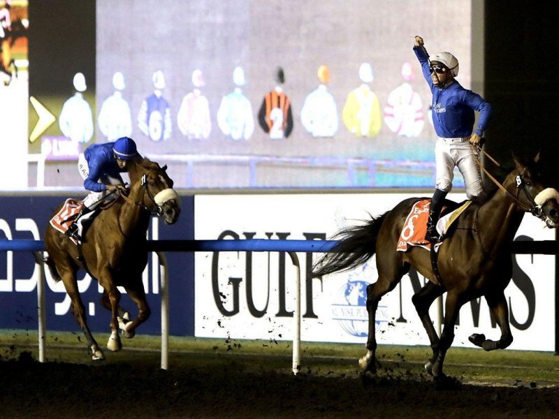 French jockey Mikael Barzalona (R) celebrates after leading Monterosso to win the Dubai World Cup horse race at the Meydan race track in the Gulf emirate on March 31, 2012. (AFP/Getty Images)