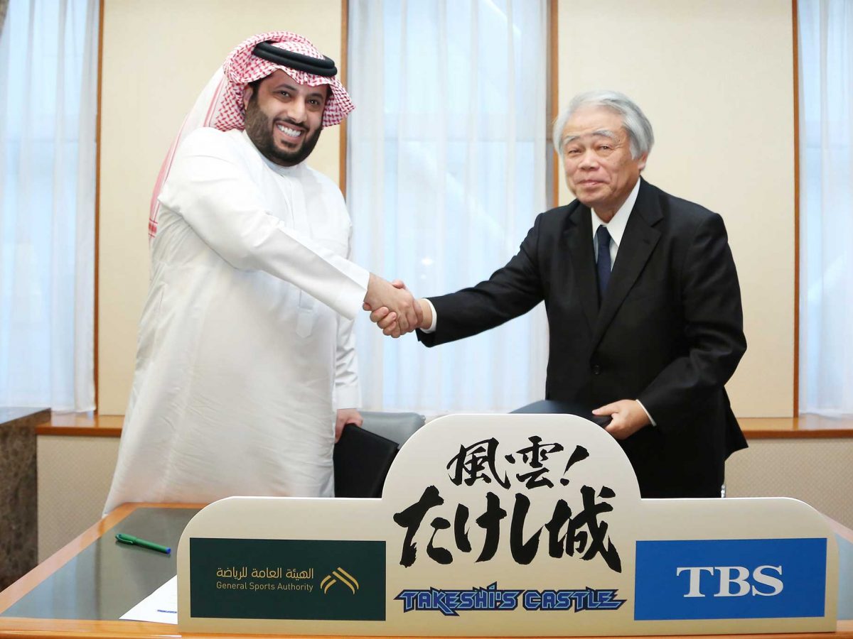 General Sports Authority (GSA) chairman Turki Al-Sheikh signs an agreement with the Tokyo Broadcasting System chairman Toshichika Ishihara to bring Takeshi's Castle back to Saudi TV screens.