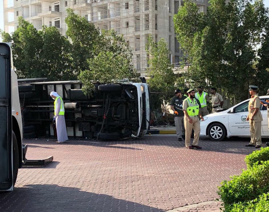 The lorry tipped on its side because of the excess load it was carrying, according to Dubai Police.