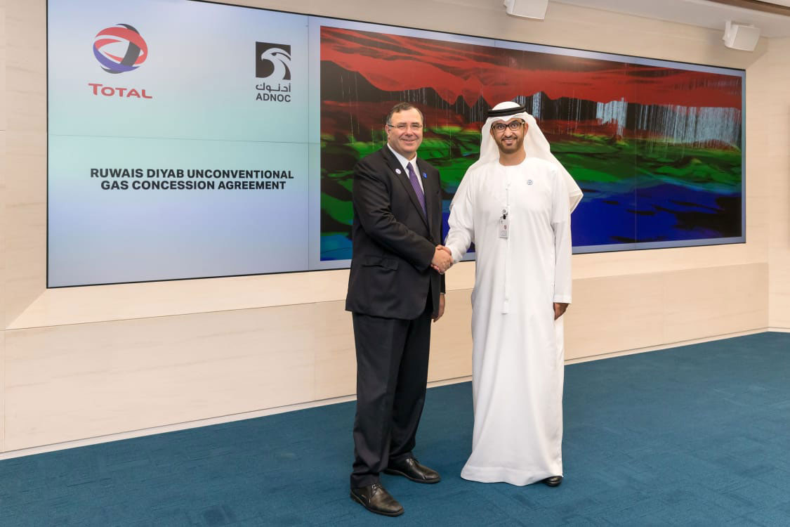 Adnoc CEO Sultan Al Jaber (right) pictured with Total CEO Patrick Pouyanne.