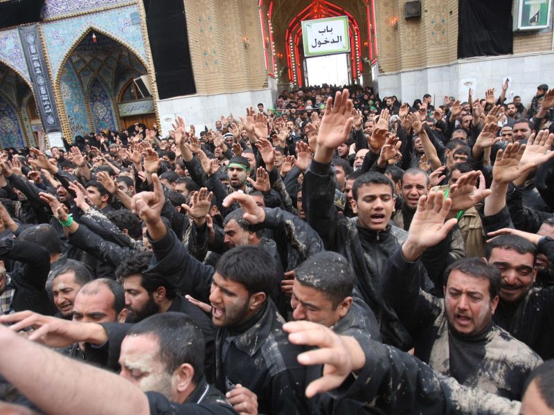 Shiite Muslim pilgrims take part in ceremonial rituals on January 25 in Karbala. Hundreds of thousands of pilgrims gathered in the city to commemorate Arbaeen, which marks the end of a 40 day mourning period for Imam Hussein (Getty Images)