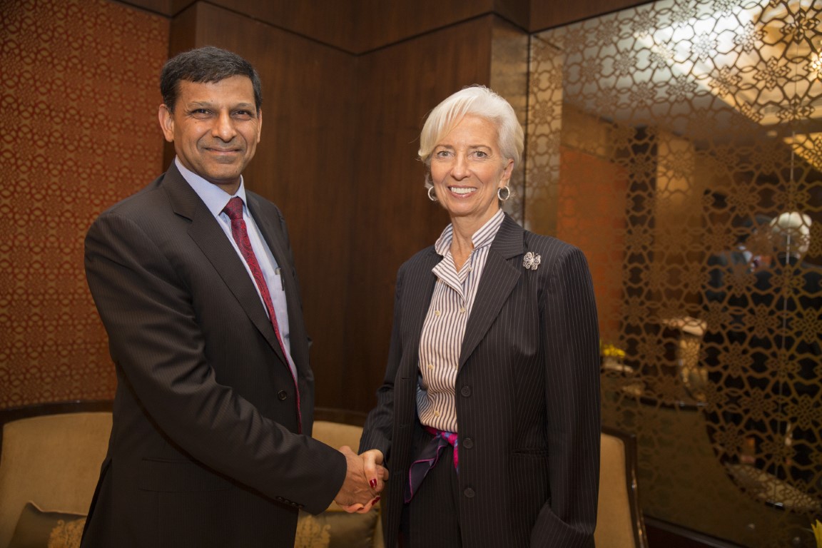 India's then Bank Governor Raghuram Rajan pictured shaking hands with IMF International Monetary Fund Managing Director Christine Lagarde during the IMF Conference Asia Advancing Investing for the Future March 12 2016 at the Taj Palace Hotel in New Delhi India  Photo: Stephen Jaffe/IMF via Getty Images.