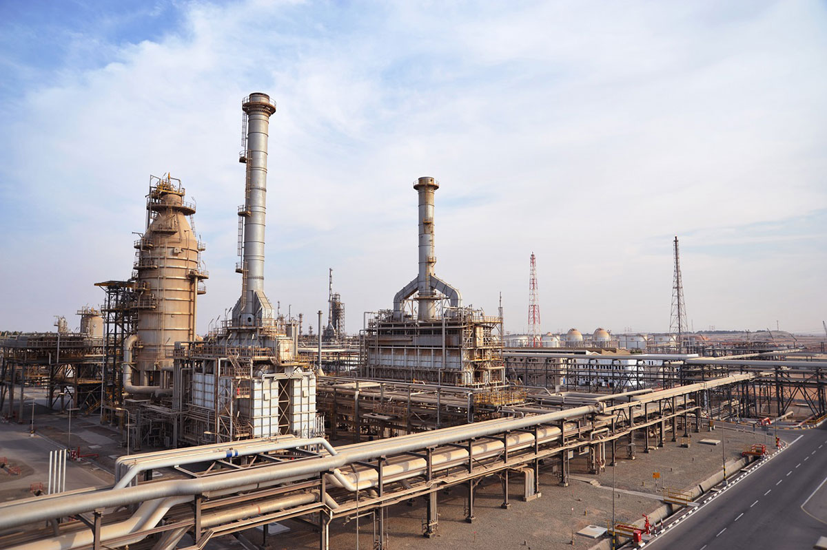 The Indian conglomerate plans to join projects at Abu Dhabi National Oil Co.’s Ruwais refining hub, the people said.