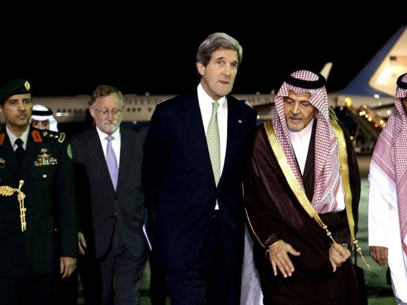 U.S. Secretary of State John Kerry (L), walks with Saudi Foreign Minister Prince Saud al-Faisal. (AFP/Getty Images)