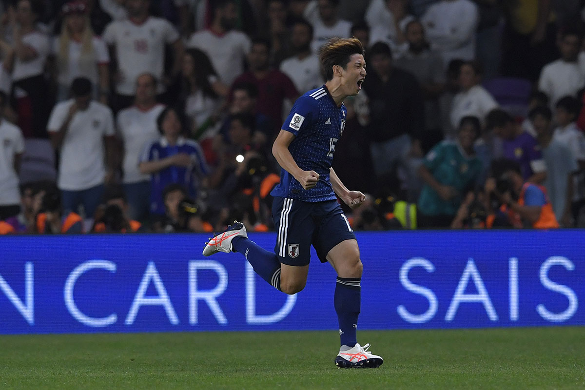 Yuya Osako of Japan celebrates scoring his teams second goal during the AFC Asian Cup semi final match between Iran and Japan at Hazza Bin Zayed Stadium on January 28, 2019 in Al Ain.