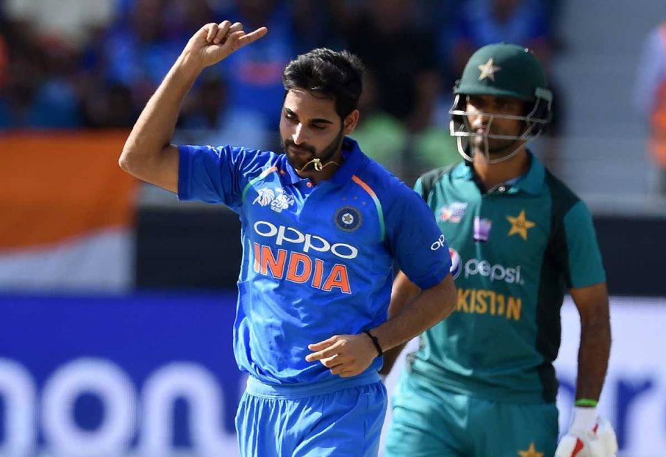 Indian cricketer Bhuvneshwar Kumar celebrates after he dismissed Pakistan batsman Imam-ul-Haq during the one day international (ODI) Asia Cup cricket match between Pakistan and India at the Dubai International Cricket Stadium in Dubai on September 19, 2018.