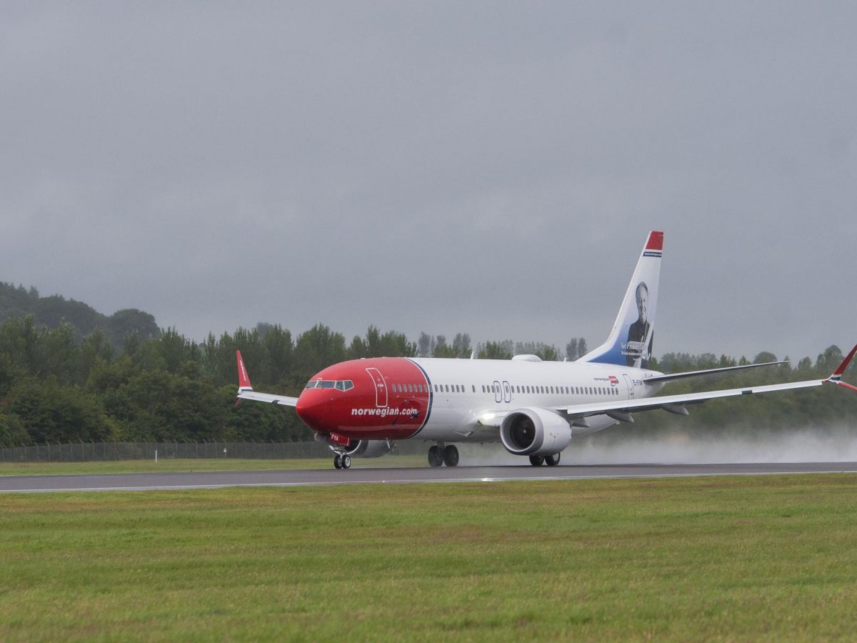 Norweigan Boeing 737 Max 8 takes off from Edinburgh Airport