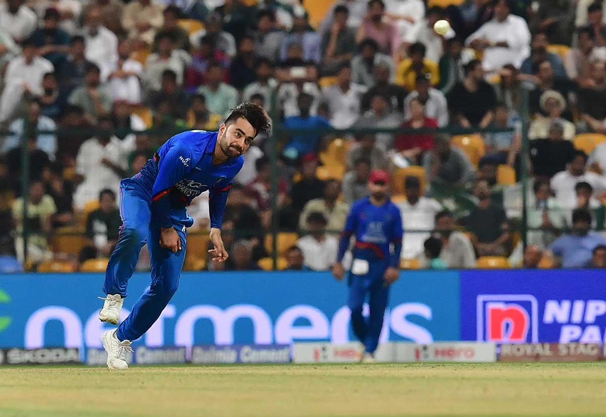 Afghanistan's Rashid Khan bowls during the one day international (ODI) Asia Cup cricket match between Pakistan and Afghanistan at The Sheikh Zayed Stadium in Abu Dhabi on September 21, 2018.