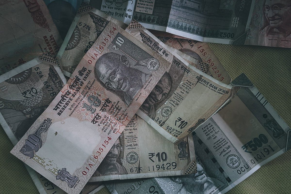 The rupee erased part of its losses on Wednesday to close  at 73.11 against the dollar, after slumping more than 140 paise over the previous two trading sessions to touch a low of 73.86 against the greenback.