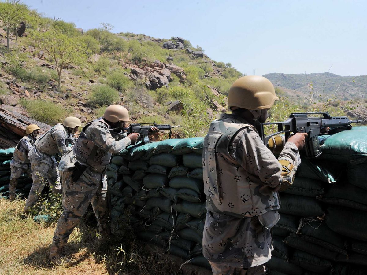 Saudi border guards keep watch along the border with Yemen in the al-Khubah area in the southern Jizan province.