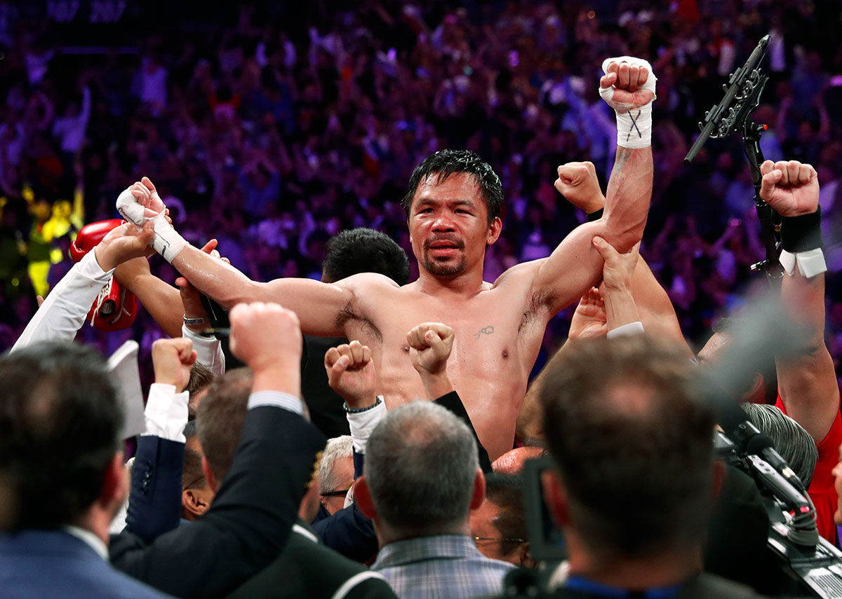 Manny Pacquiao celebrates his split decision victory over Keith Thurman in their WBA welterweight title fight at MGM Grand Garden Arena on July 20, 2019 in Las Vegas, Nevada.