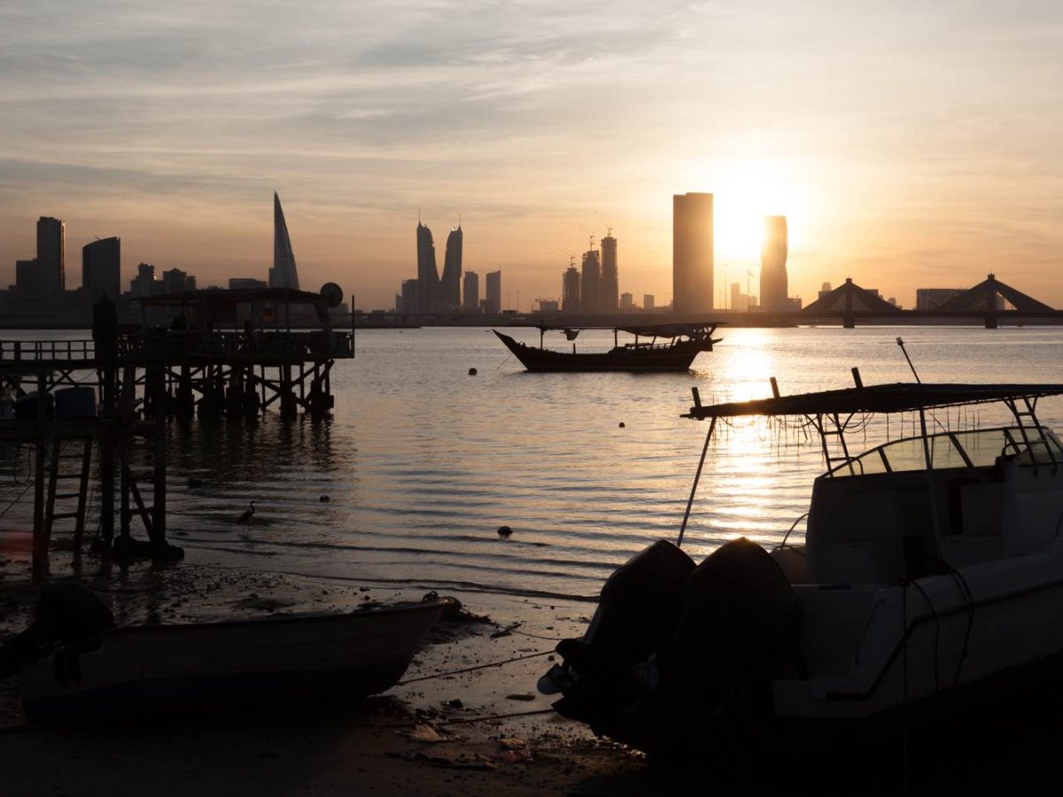 Fishing pier and boats in Manama at sunset kingdom of Bahrain. Image: Bahrain Economic Development Board