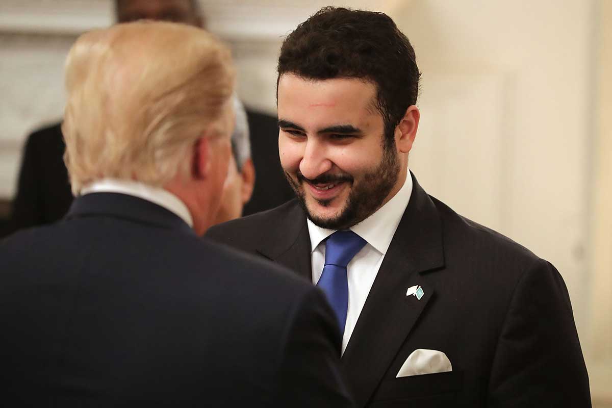 US President Donald Trump (L) greets The Saudi Ambassador to the United States Prince Khalid bin Salman bin Abdulaziz during an Iftar dinner in the State Dining Room at the White House June 6, 2018 in Washington, DC.