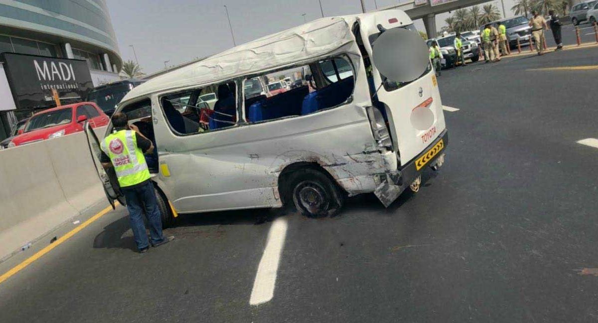 Tyre blowout caused minibus to collide with cement barrier. Image: Dubai Police.