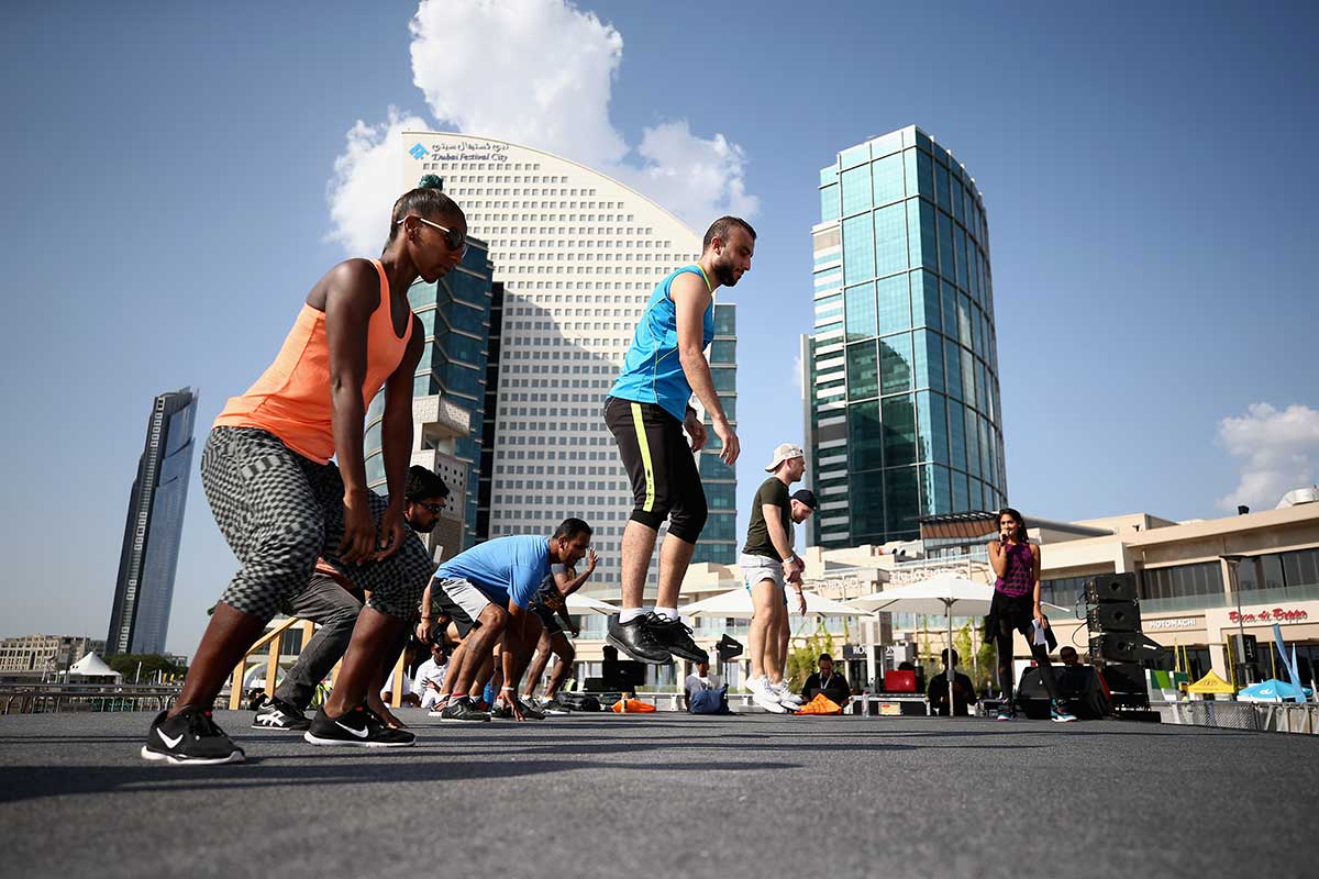 People participate in the Dubai Fitness Challenge at Dubai Festival City on November 18, 2017. (Getty Images for Dubai Tourism)