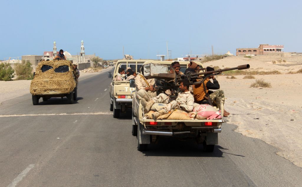 Yemeni fighters loyal to the Saudi-backed Yemeni president ride in the back of a pickup truck as they man an antiaircraft gun on a road leading to the town of Khokha, about 120 kilometres south of the Houthi rebelheld Red Sea port of Hodeida
Photo: SALEH ALOBEIDI/AFP/Getty Images