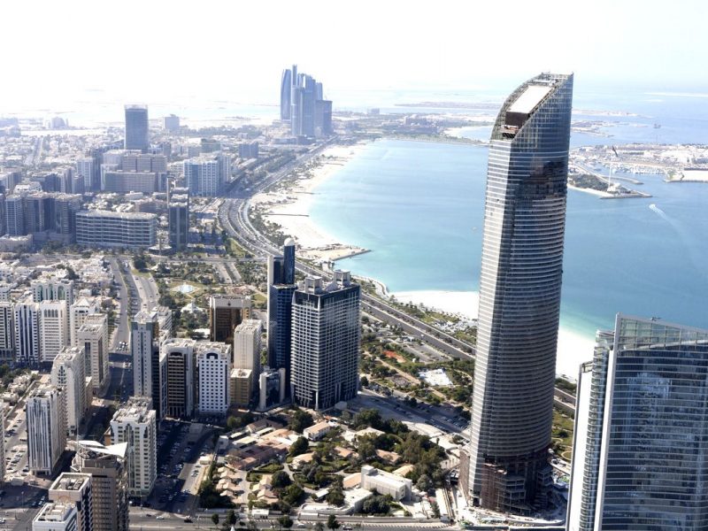 Skyscrapers stand on the skyline viewed from the Central Market in Abu Dhabi, United Arab Emirates, on Wednesday, Jan. 11, 2012. Abu Dhabi, the oil-rich sheikhdom that spent 36 billion Dirhams ($9.8 billion) bailing out its biggest developer in 2011, will probably reach for its checkbook again as property companies in the United Arab Emira