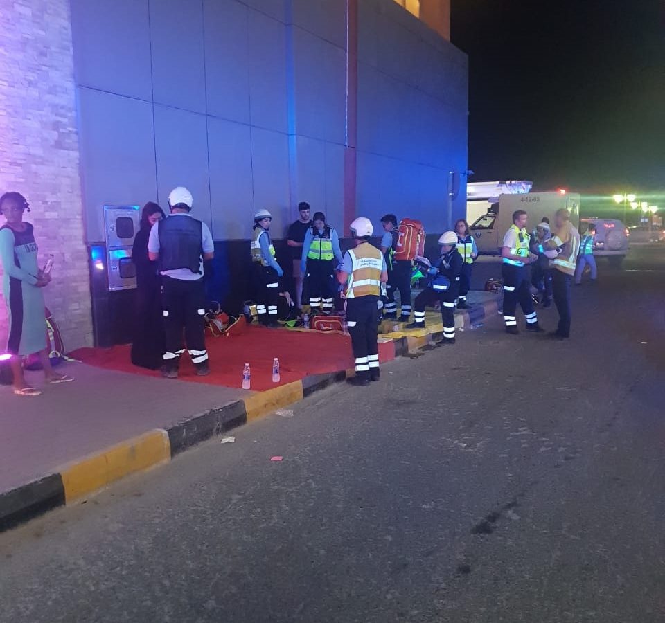 Firefighters at the scene of the fire on Ajman Corniche. (Photo: WAM)