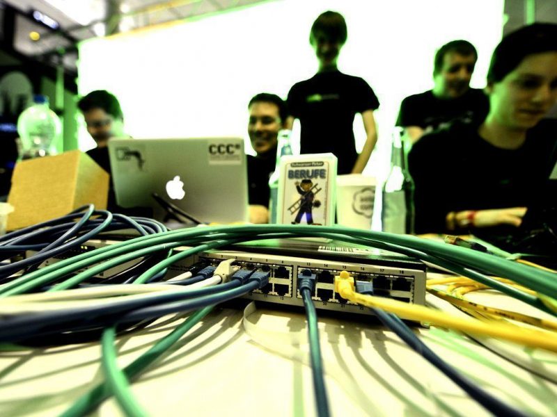 Participants work at their laptops at the annual Chaos Computer Club (CCC) computer hackers congress, called 29C3, on December 28, 2012 in Hamburg, Germany. The 29th Chaos Communication Congress (29C3) attracts hundreds of participants worldwide annually to engage in workshops and lectures discussing the role of technology in society and i