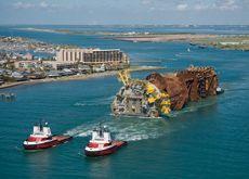 AUGUST: The Perdido Spar unit heads out into the Gulf of Mexico on the final leg of its journey to Alaminos Canyon.